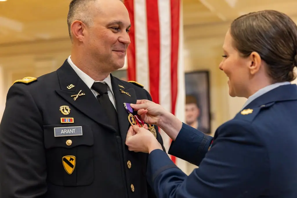 Heartwarming Ceremony at EPCOT Honors Disney Cast Member with Purple Heart